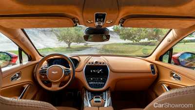 Aston Martin’s DBX Tries To Be Part Vantage, Lotus, Bentley